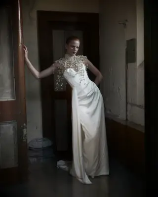 Model poses in wedding gown