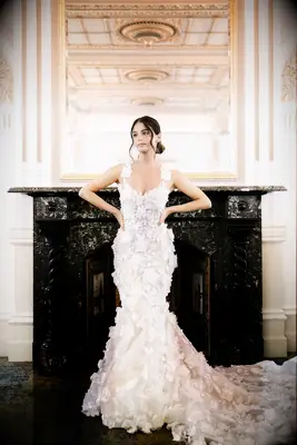 Model poses in wedding gown