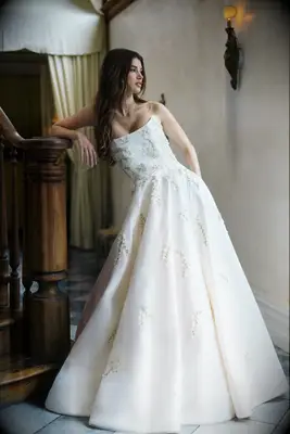 Model poses in wedding gown