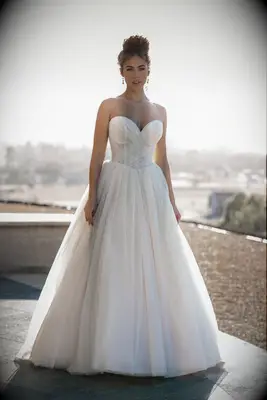 Model poses in wedding gown