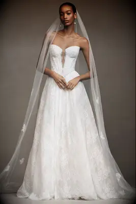 Strapless lace and corset basque waist dress