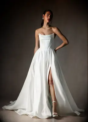 Structured strapless wedding dress with slit