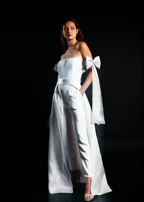 Andrew Kwon corset bodice bridal jumpsuit with bows