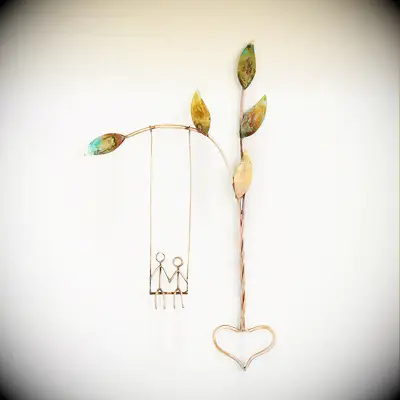 Uncommon Goods copper swing sculpture anniversary gift