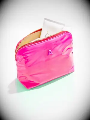 Mini pink initial makeup bag