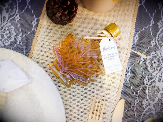 Mini maple syrup jar rustic wedding favor shaped like leaf