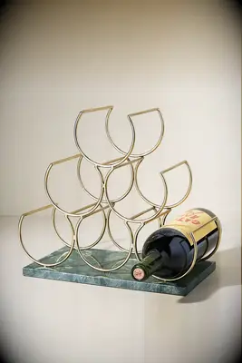 Gold wine bottle holder