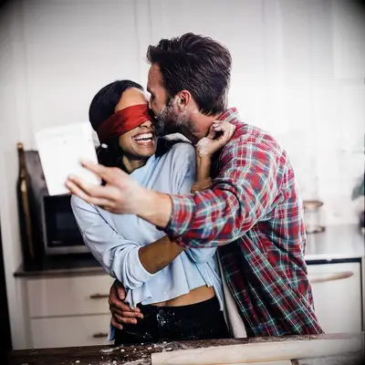 Couple laughing and taking a picture together