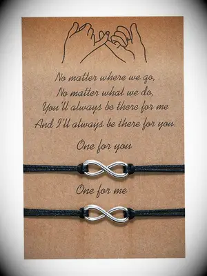 Silver infinity charm and black rope matching couples bracelets