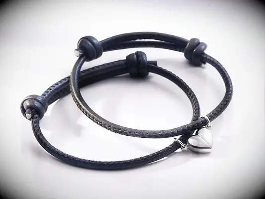 Navy rope wristlet with magnetic heart charm matching couples bracelets