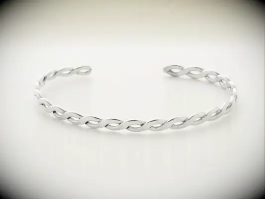 Silver cuff bracelet with intertwined robes matching couples bracelet