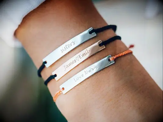 Pura Vida friendship bracelet with silver engravable bar charm matching couples bracelets