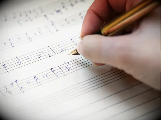 Person writing music, custom song gift for wife