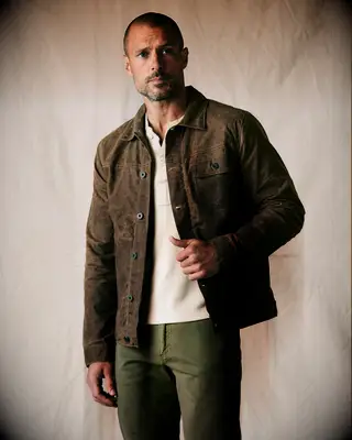 Man wearing a brown jacket