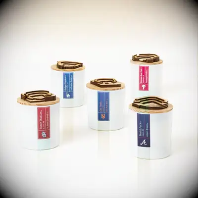 Selection of candles with MLB stadium sculpture on lid