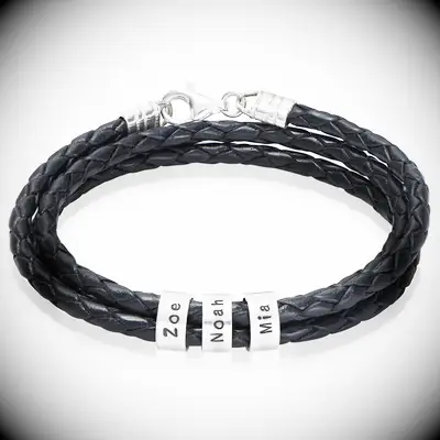 Black leather braided bracelet with personalized name charms for three year anniversary gift