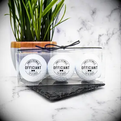 Golf balls personalized with officiant