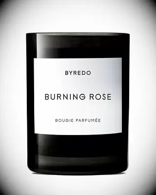 Burning rose candle