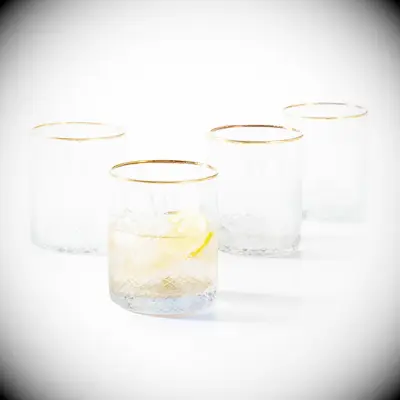 Gold rimmed whiskey glasses with monogram