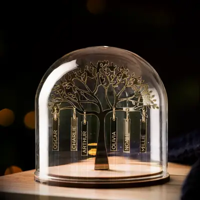 Gold family tree ornament with engraved names