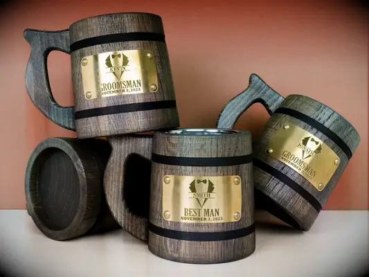 Four wooden tankards with gold plates for Groomsmen and the Best Man from Etsy
