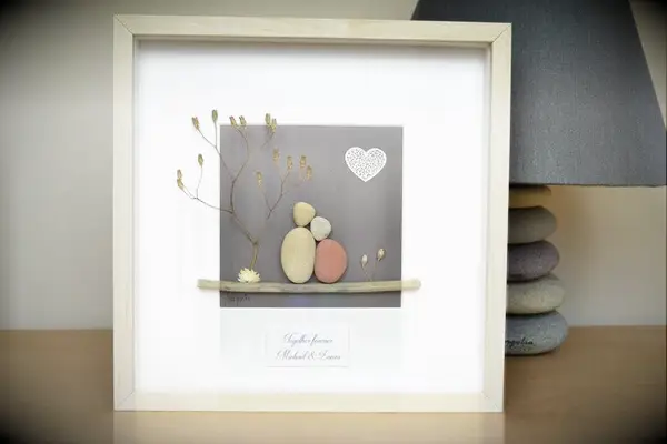 Anniversary pebble art with lace heart