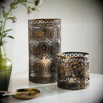 Iron candleholder with lace pattern from Terrain