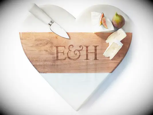 Wood and marble heart-shaped cheese board engagement party gift from parents