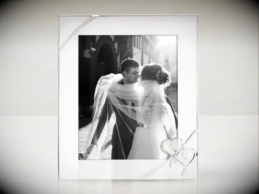 Silver frame with heart design in bottom right corner engagement gift from parents