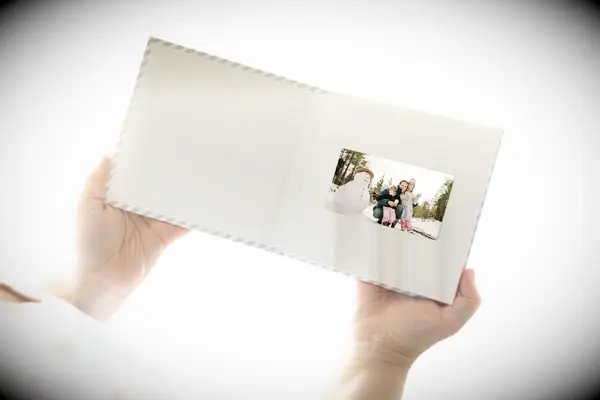 Hard cover book that displays video memories for the viewer wedding gift for brother