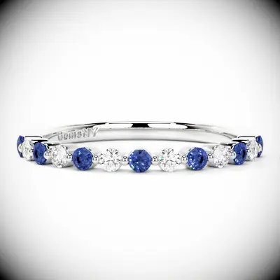 Blue sapphire half eternity ring