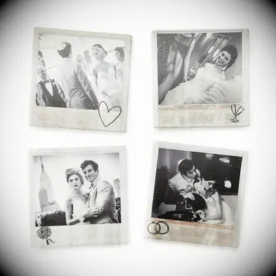 Various coasters display custom photographs from a couple