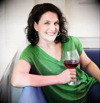 Woman drinking a glass of red wine