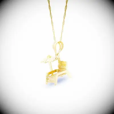 Gold beach chair necklace