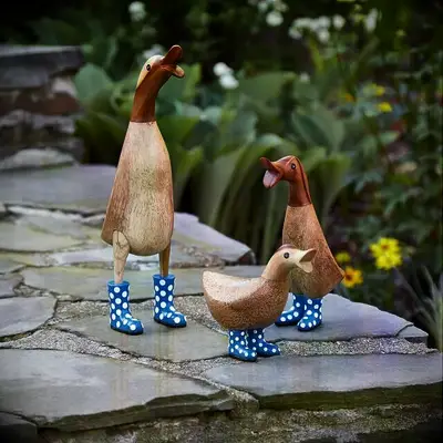 Ducks wearing boots ornament 