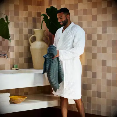 Man wearing a waffle robe