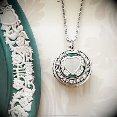 Heart locket necklace with diamonds