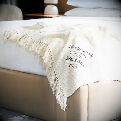 Anniversary embroidered throw blanket