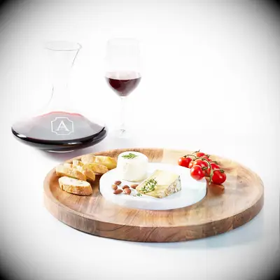 Monogrammed wine decanter and cheese board mother-of-the-groom bridal shower gift