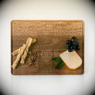 Beautiful wooden cutting board featuring custom initials housewarming gift for couple
