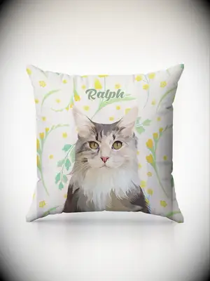 Custom cushion depicting the face and name of a beloved pet. 