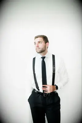 Monogrammed suspenders groomsman gift