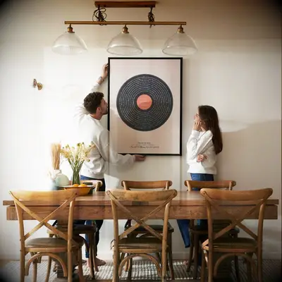 Couple hanging up a custom song art