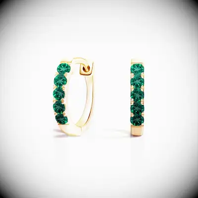 Emerald huggie earrings from Brilliant Earth 35th anniversary gift