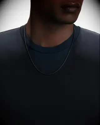Man wearing steel chain necklace anniversary gift