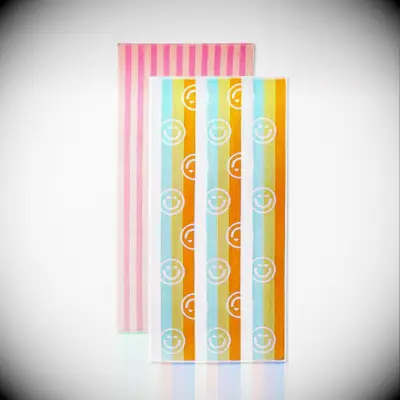 Colorful beach towels with smiling faces and vertical stripes