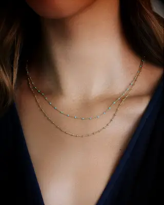 Layered turquoise necklace with gold metal