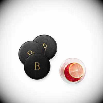 Monogrammed black leather drink coasters