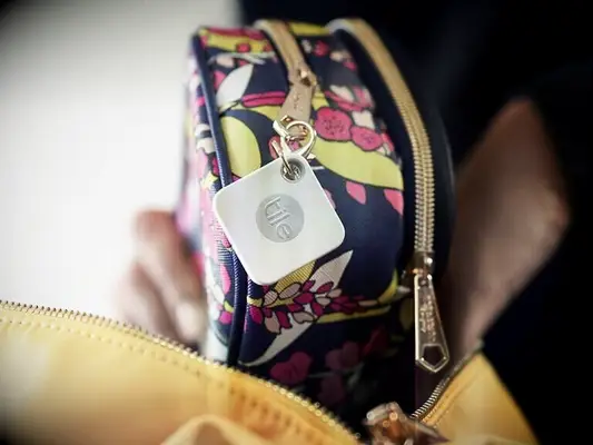 Tile key ring on makeup bag stocking stuffer for wife