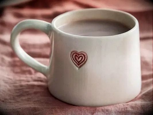 White ceramic mug with red heart just because gift